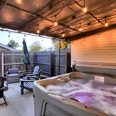 Outdoor Oasis: Unwind in the hot tub under twinkling lights in your private retreat!
