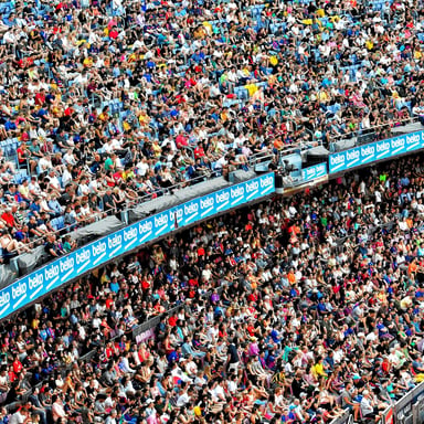 Packed college football stadium crowd aerial view